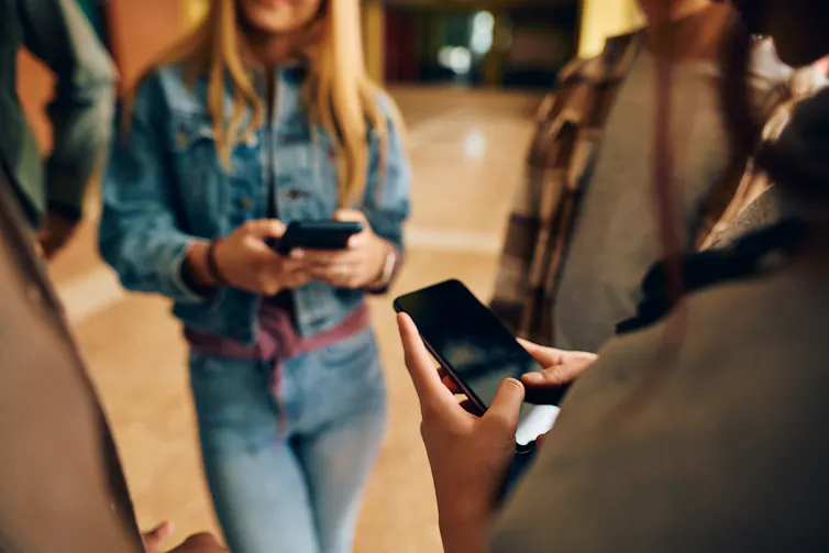 Teenagers on phones
