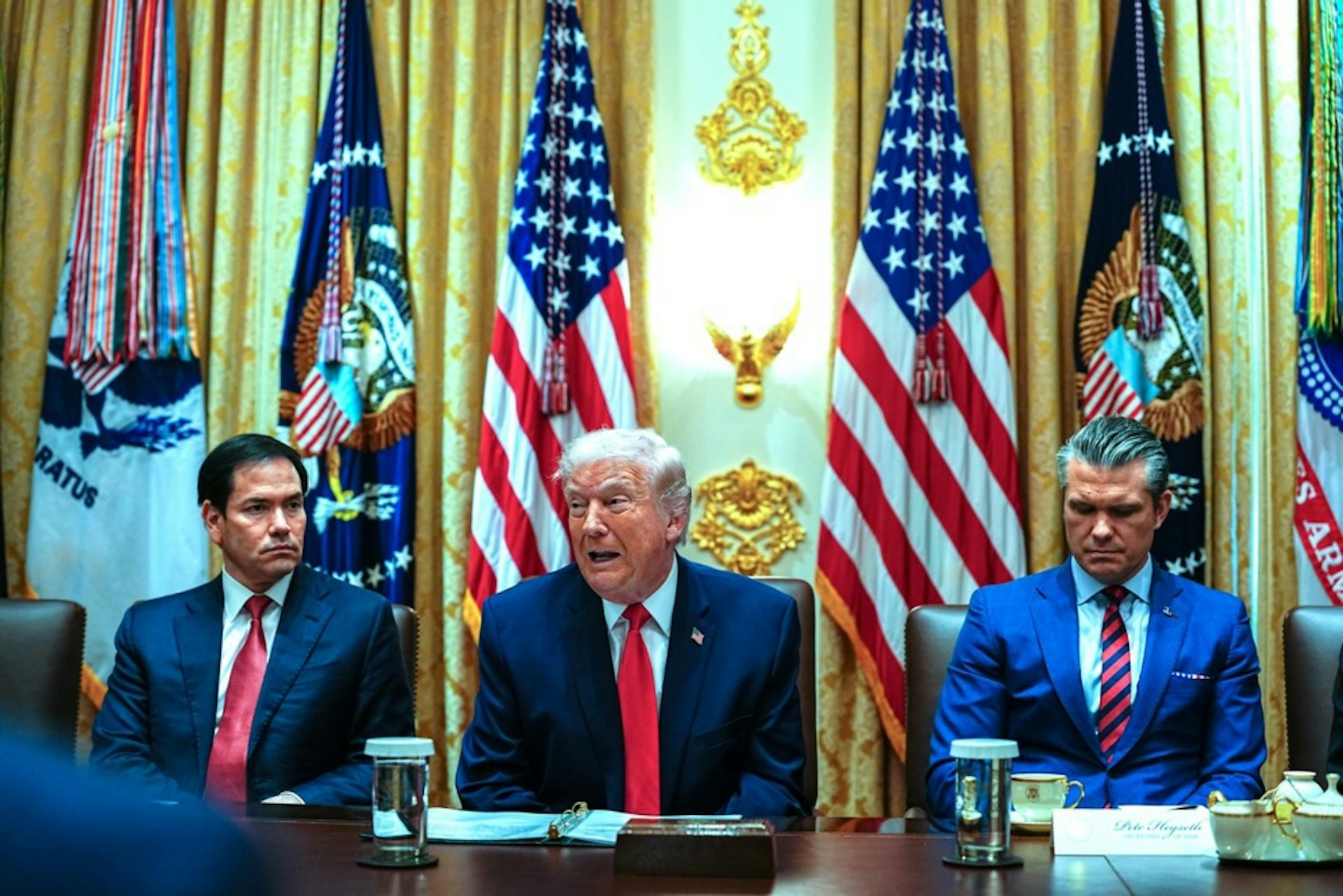 Marco Rubio, Donald Trump and Pete Hegseth.