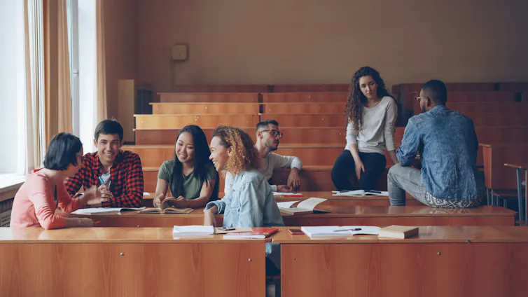 Students in a classroom in discussion.
