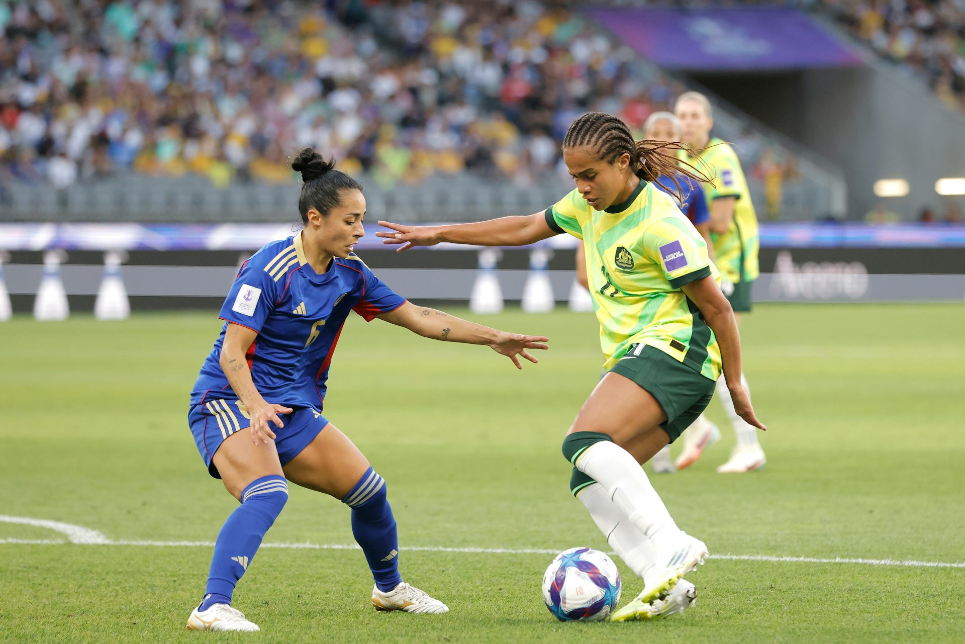 Mary Fowler of Australia takes on Jaclyn Sawicki of the Philippines during the Asian Women's Cup.