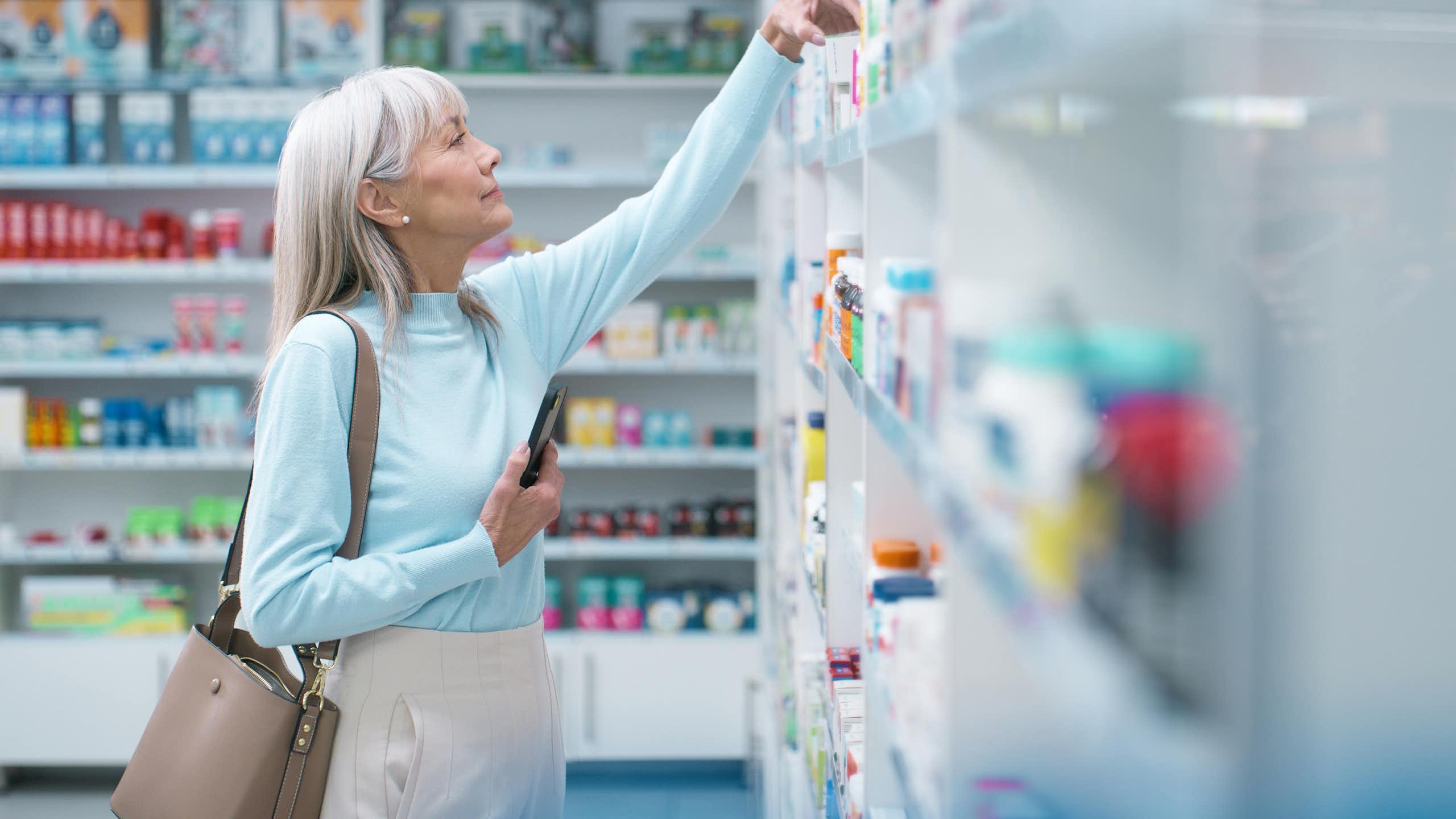 Woman shops for vitamin C supplement