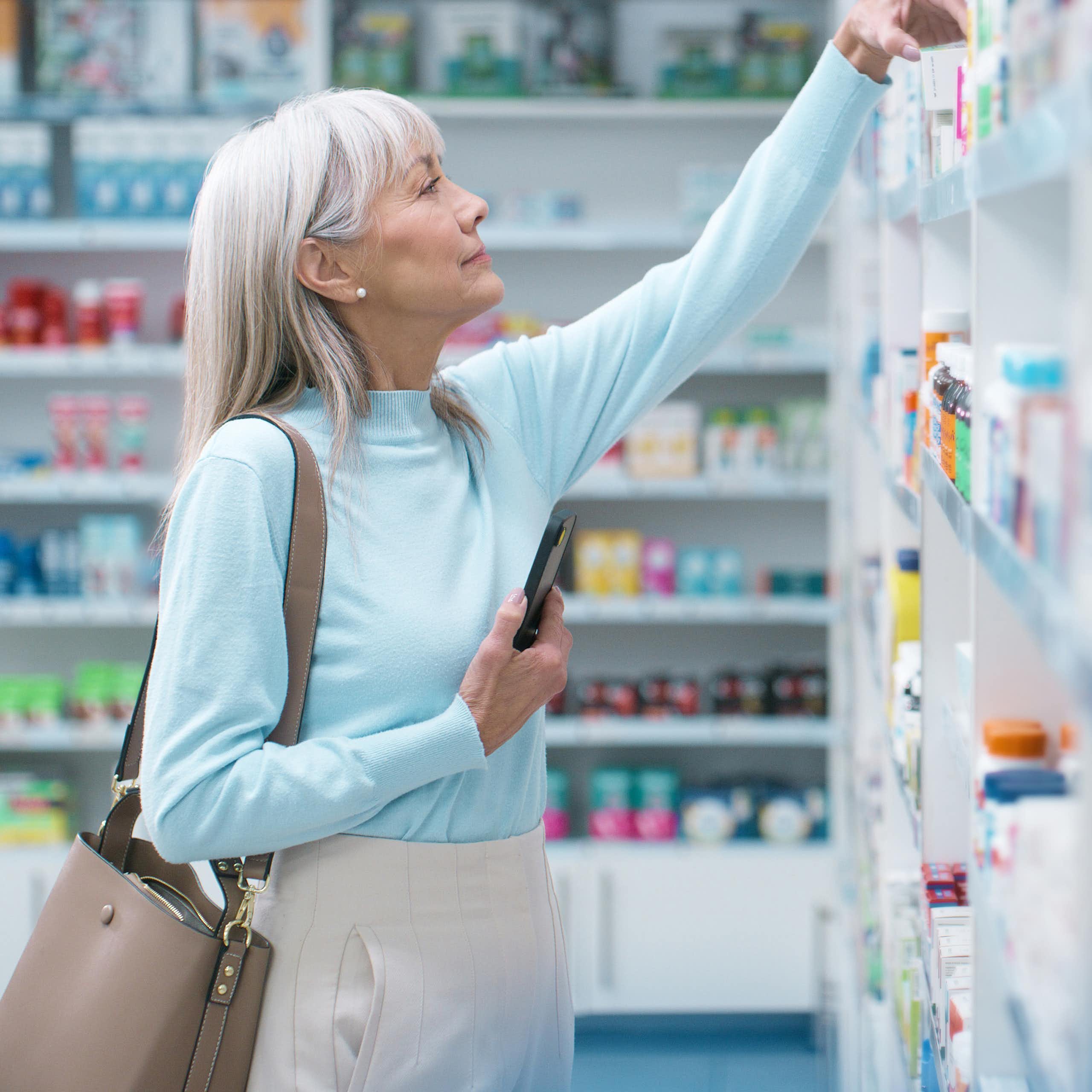 Woman shops for vitamin C supplement