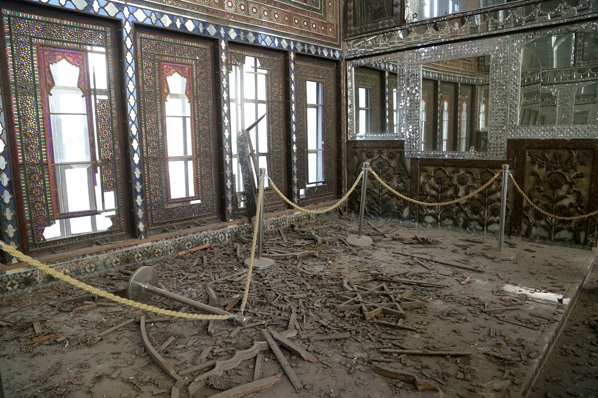 Debris litters the floor inside Golestan Palace