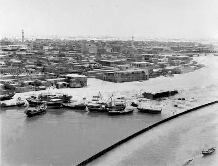 A black and white photo of the Al Ras historic district of the Deira region of Dubai
