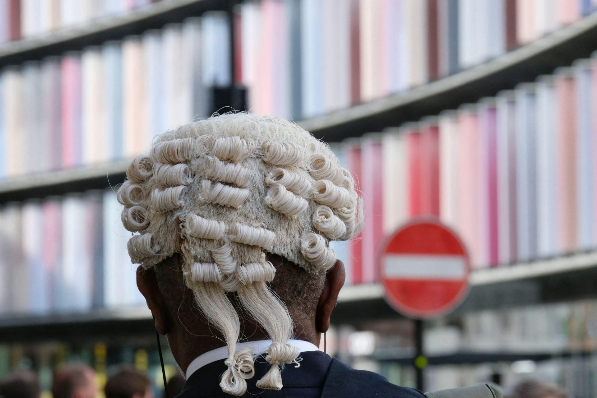 View from behind of a barrister in his wig