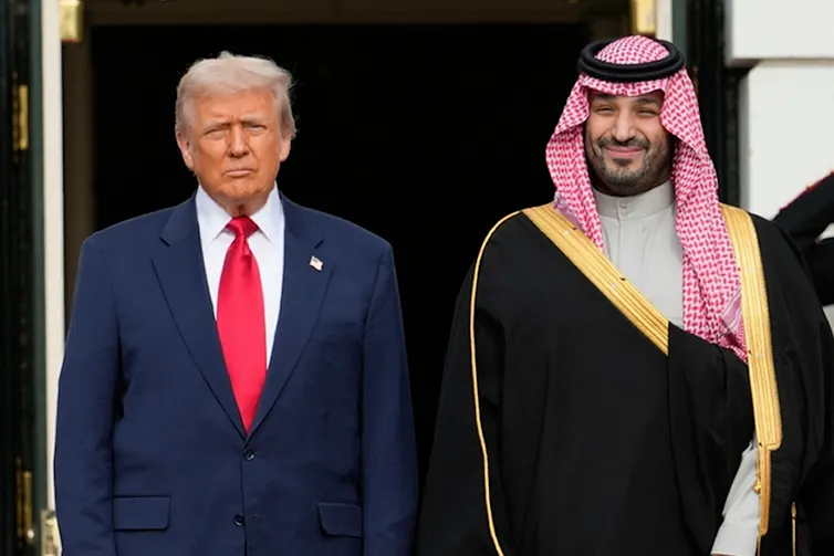 Two political leaders stand side by side in a photo op.