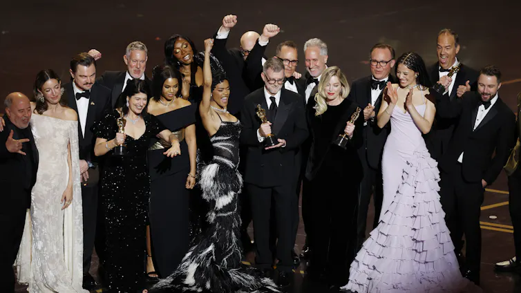 The cast of One Battle After Another collect their awards