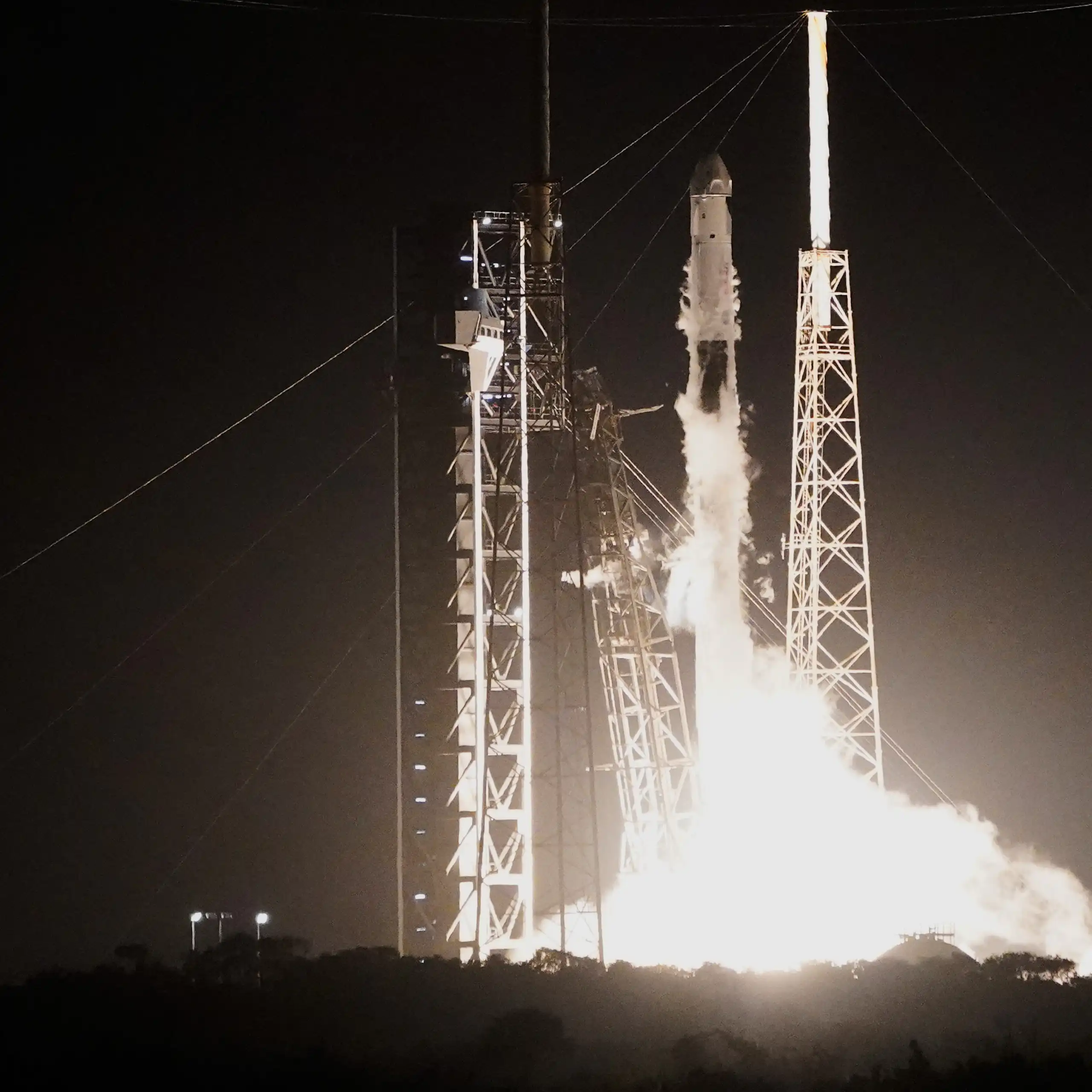 A SpaceX Falcon 9 rocket lifts off from a pad at the Cape Canaveral Space Force Station in Florida