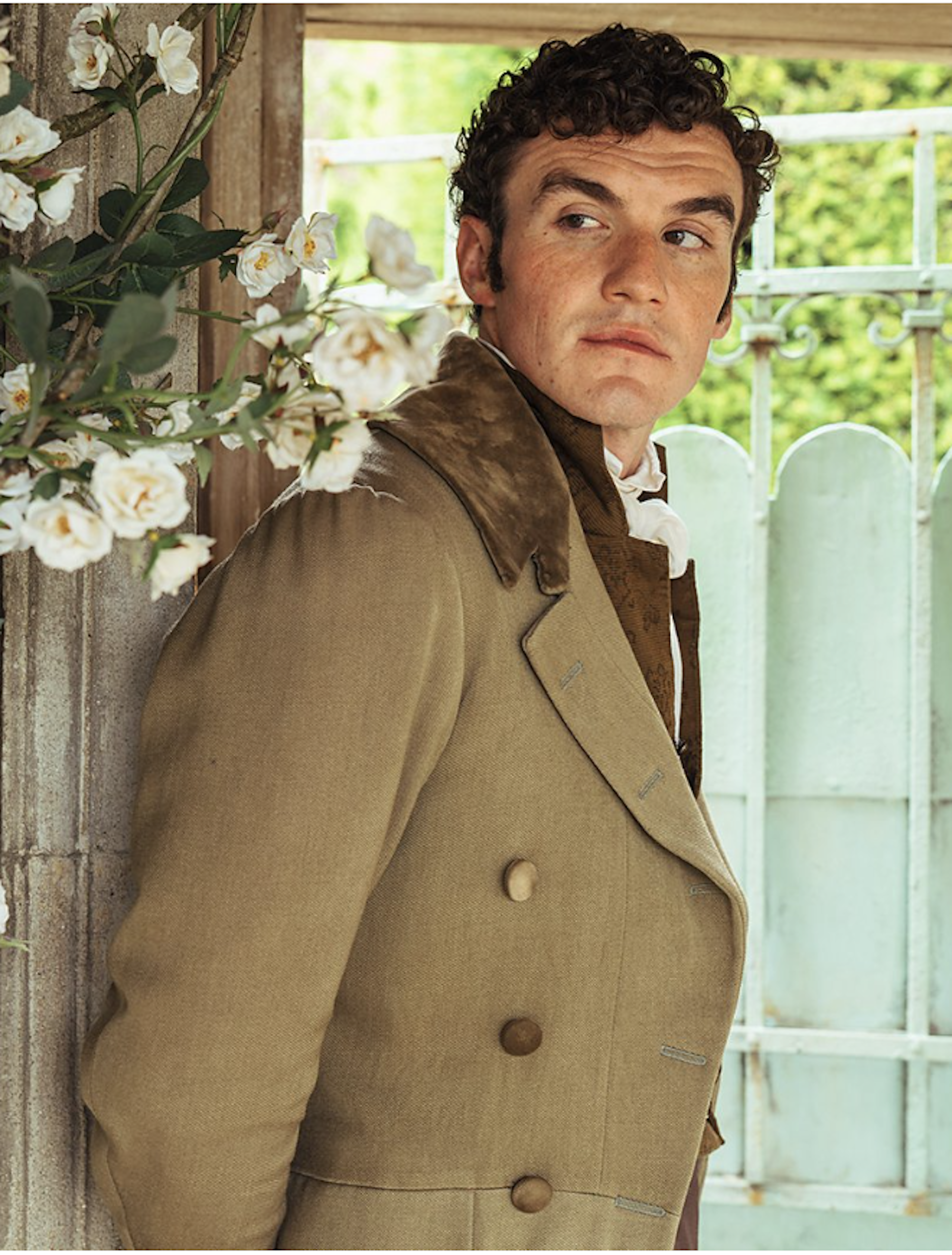 A young man in Regency dress.