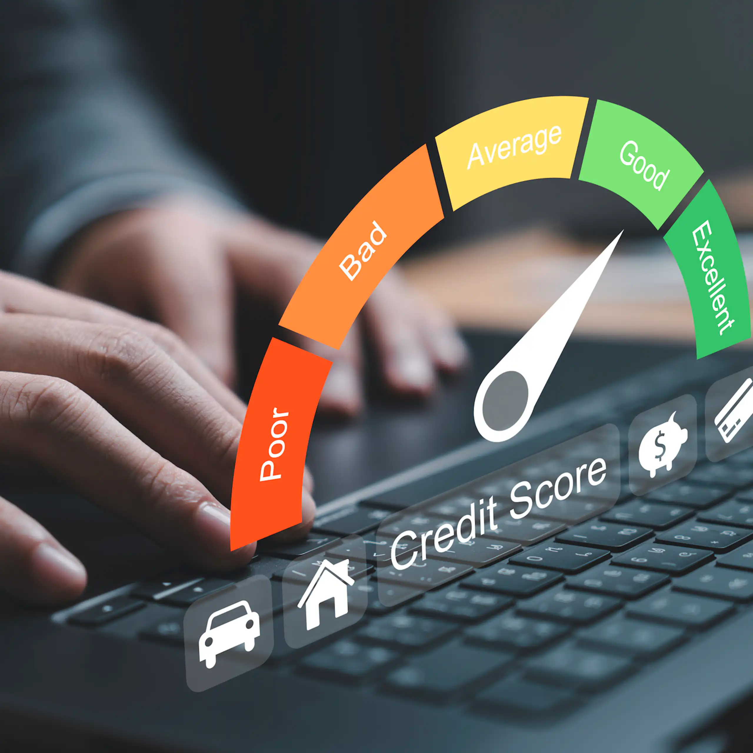 Hands type on a keyboard, as the words 'credit score' and a colored chart float above.