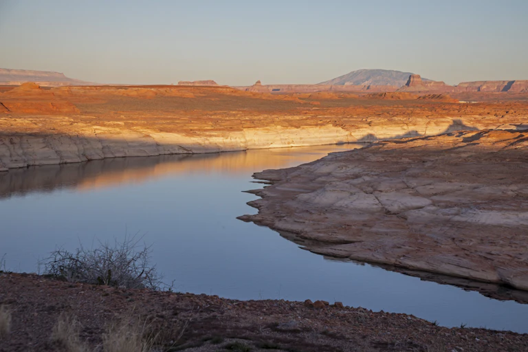A view of a lake with a very large exposed shoreline.