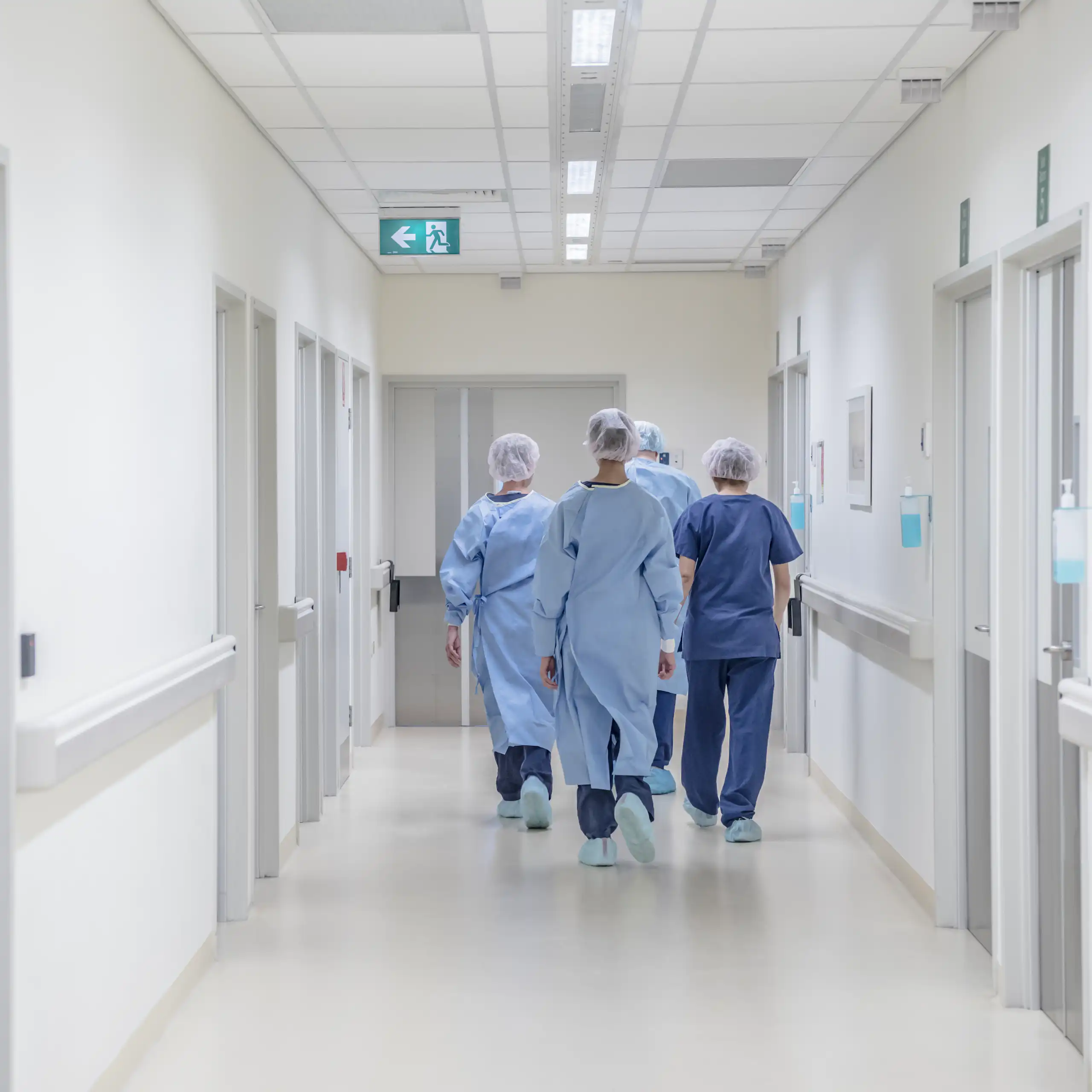 Doctors walking down a hospital corridor