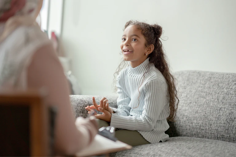 Girl talks to psychologist