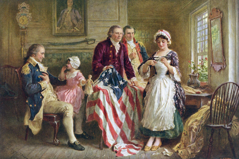 An illustration of a group of men and women in colonial dress with the man in the center holding a U.S. flag with 13 stars