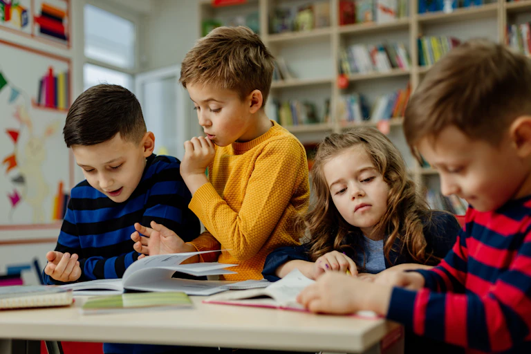 Children looking at books together