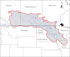 a map showing a highlighted part of central north america along the Canada-US border