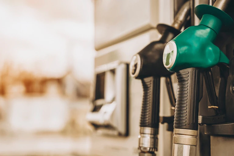 generic petrol and diesel pumps in a filling station.