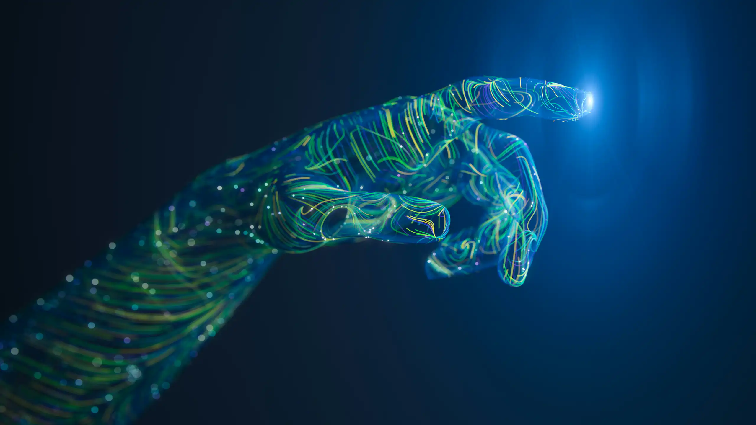 computer wiring in the form of a human hand reaching out against a dark background