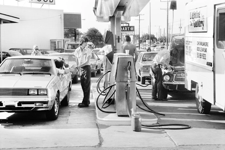 Cars lined up at Gas Station waiting for Fuel in 1979