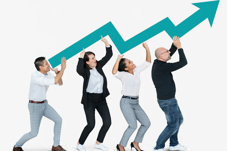 Four employees carry an arrow representing company profits on the rise