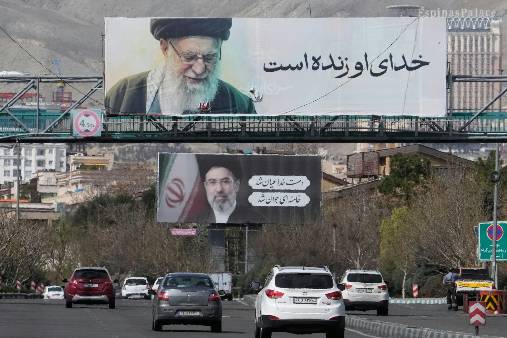 A freeway in Tehran with pictures of the assassinated supreme leader Ali Khanenei and his son, the new supreme leader, Mojtaba Khamenei.