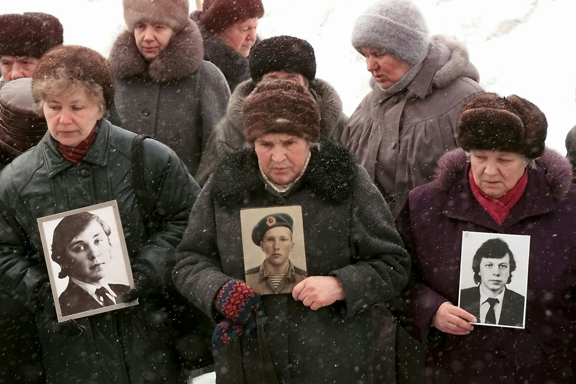 Mothers of Russian soldiers killed in Chechnya with pictures of their sons, February 2000/
