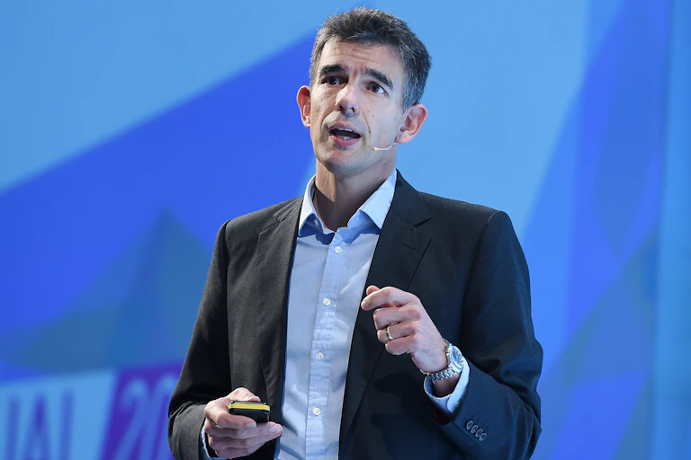 Matt Brittin speaking on a stage