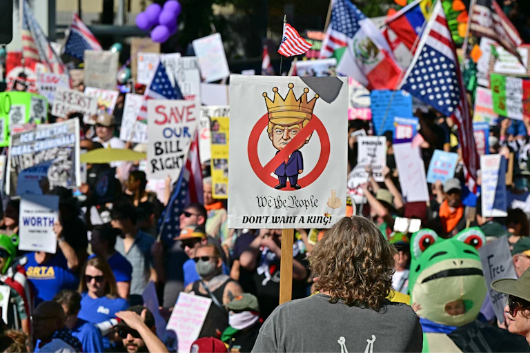 A 'No Kings' protest attracts many protesters.
