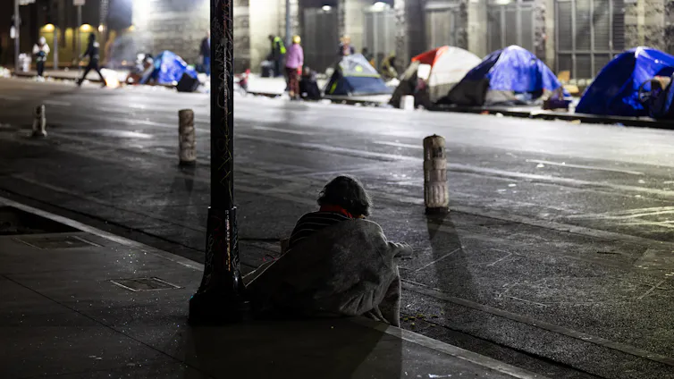 Homeless people and their tents.
