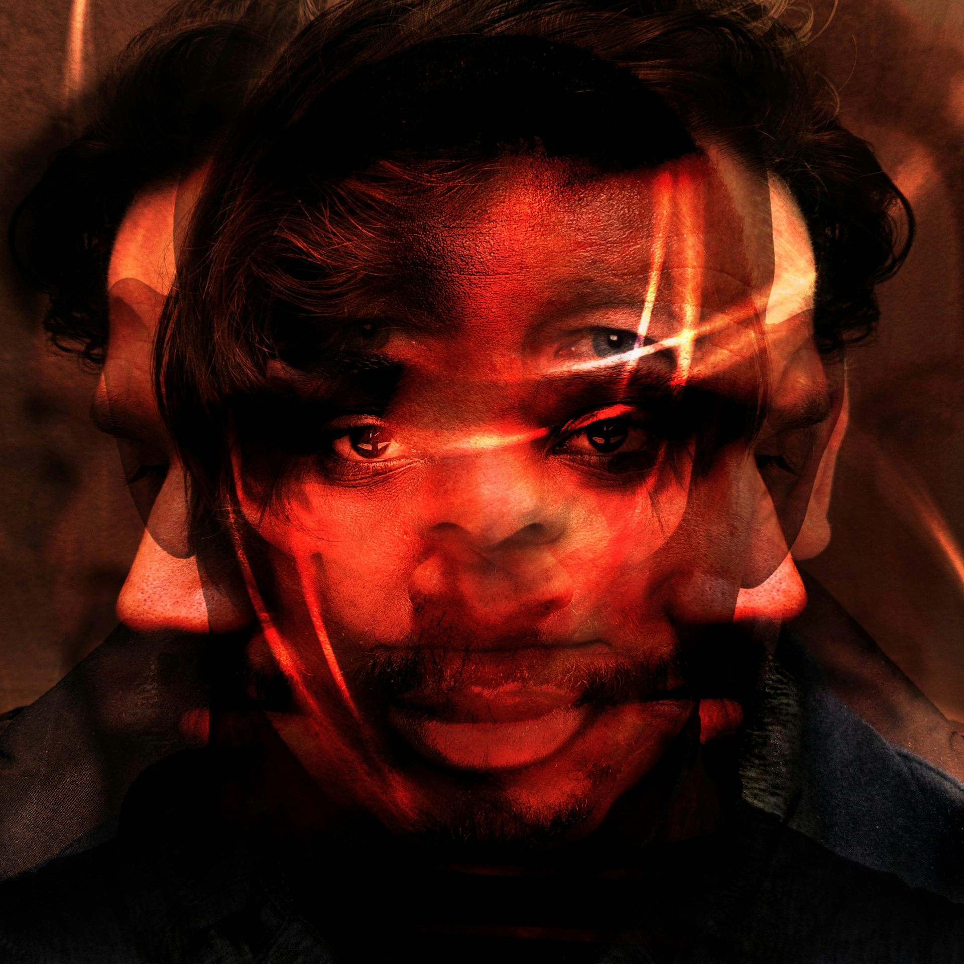 A graphic depiction of mental illness. The faces of multiple men have been overlaid one another. Each looks sad or anguished.