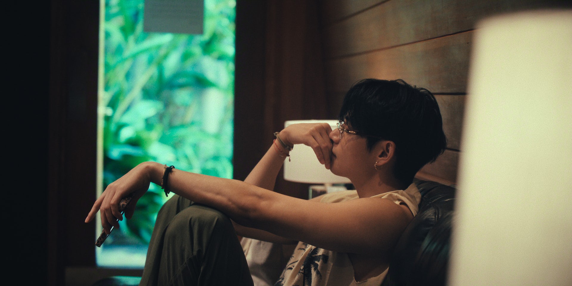 V sitting looking contemplative