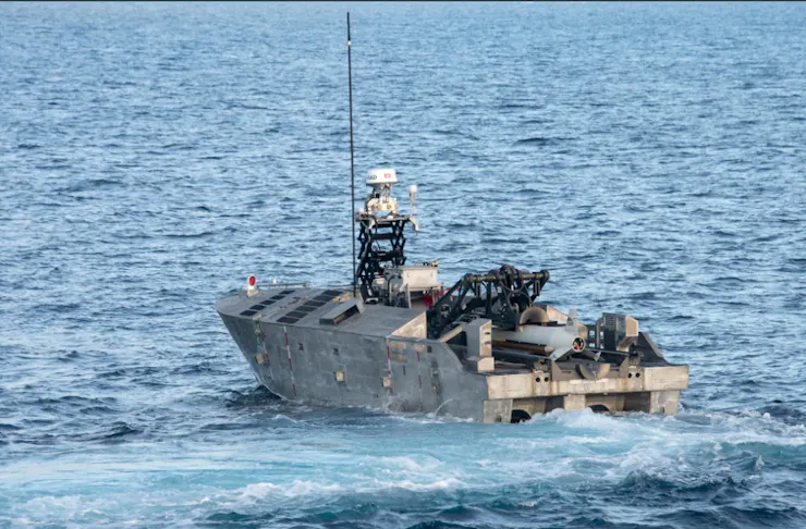 a small boat with a closed top and several electronic devices onboard