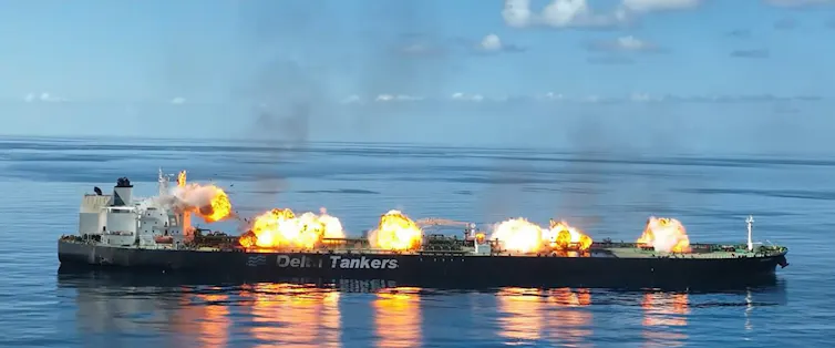 smoke rising from an oil tanker following an attack
