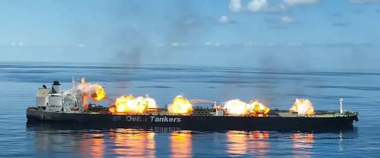 smoke rising from an oil tanker following an attack