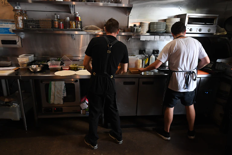 Kitchen workers at a restaurant
