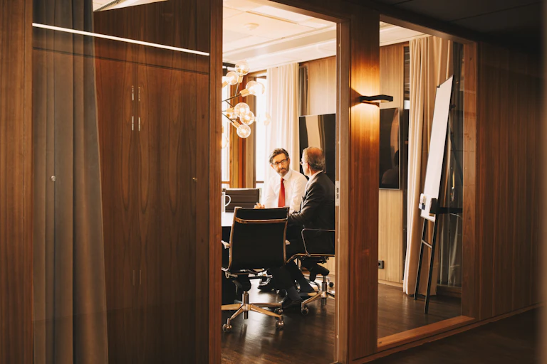 Men having a discussion in a boardroom