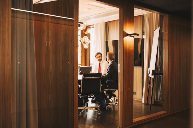 Men having a discussion in a boardroom