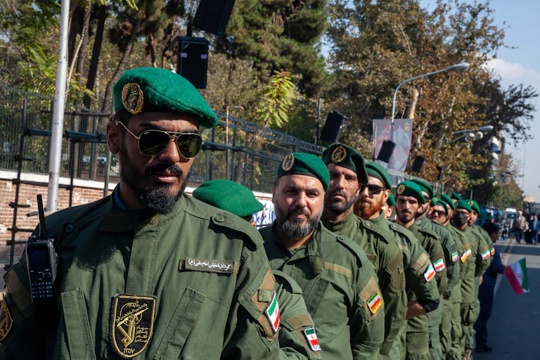 a row of soldiers dressed in green