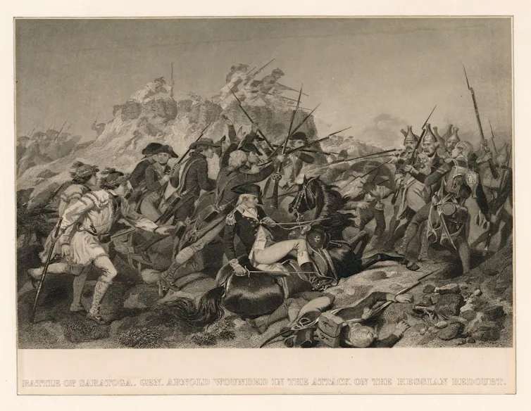 A lot of soldiers in colonial uniforms fighting each other.