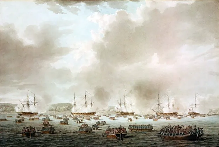 A painting of many warships from the 18th century bombarding a site on land.