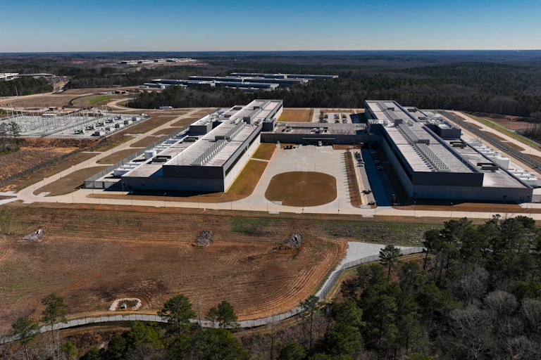 A view of large buildings housing an AI data centre.