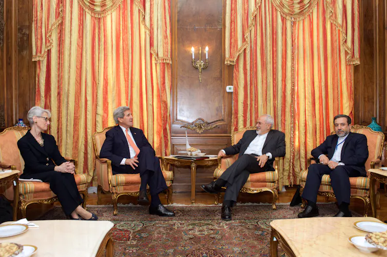 US secretary of state, John Kerry, and Iranian foreign minister, Javad Zarif during negotiations for the 2015 nuclear deal. Abbas Araghchi, now Iran's foreign minister, is at the far right of the group.