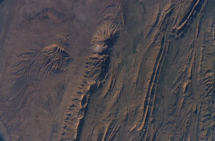 An overhead view of a folded and rumpled landscape.