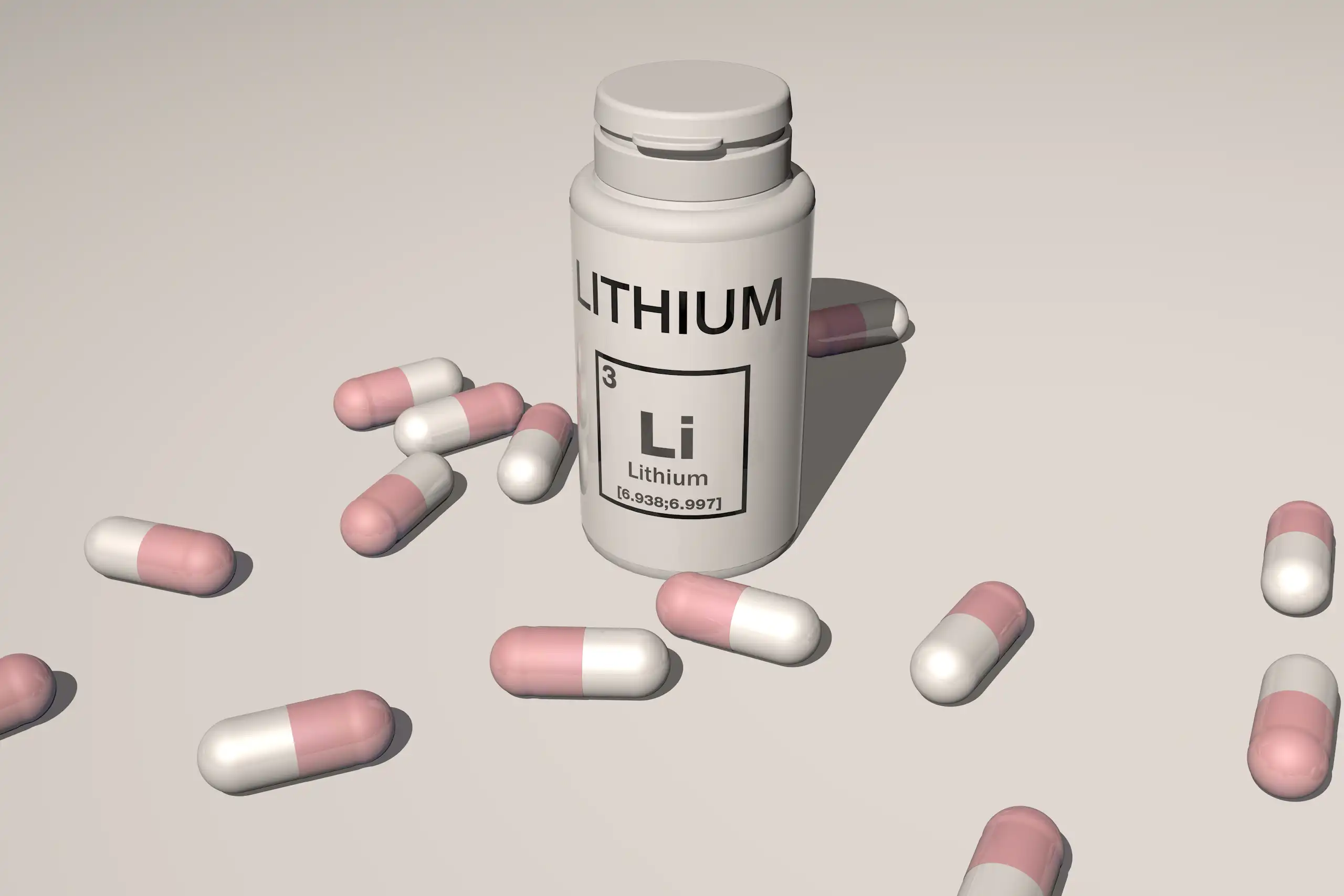 Un pot amb la paraula Lithium escrita i moltes càpsules al voltant d'ell.