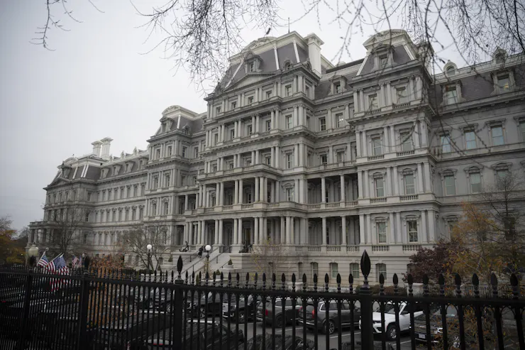 Stately, ornate, granite building.