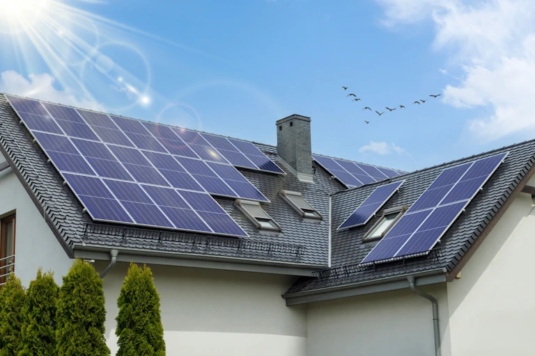 A house with solar panels on the roof.