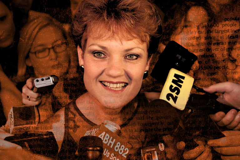 Sepia-toned image of Pauline Hanson surrounded by microphones