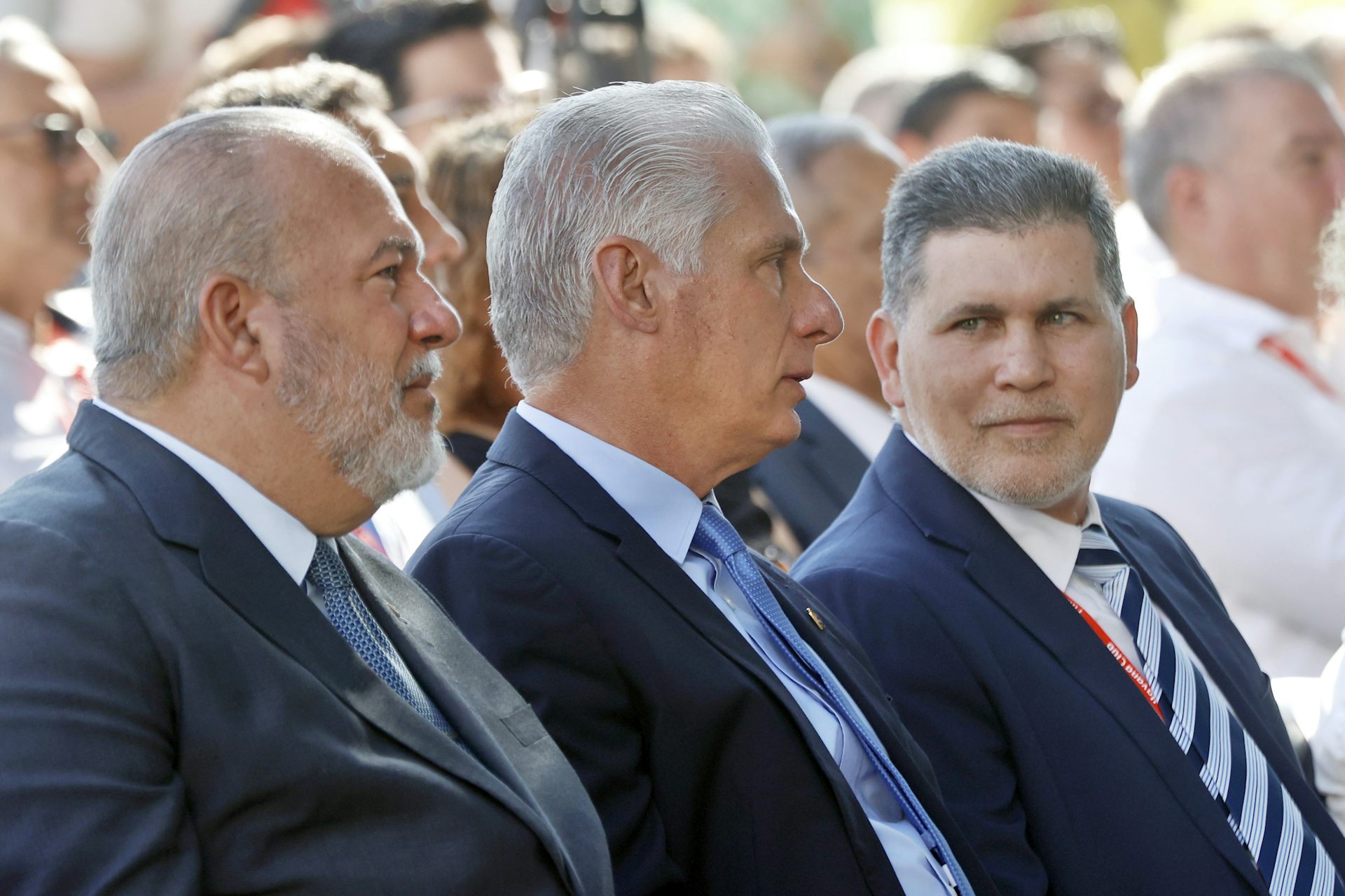 Oscar Pérez-Oliva Fraga sits alongside Miguel Díaz-Canel.