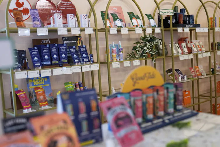 Shelves of cannabis products on display in a store