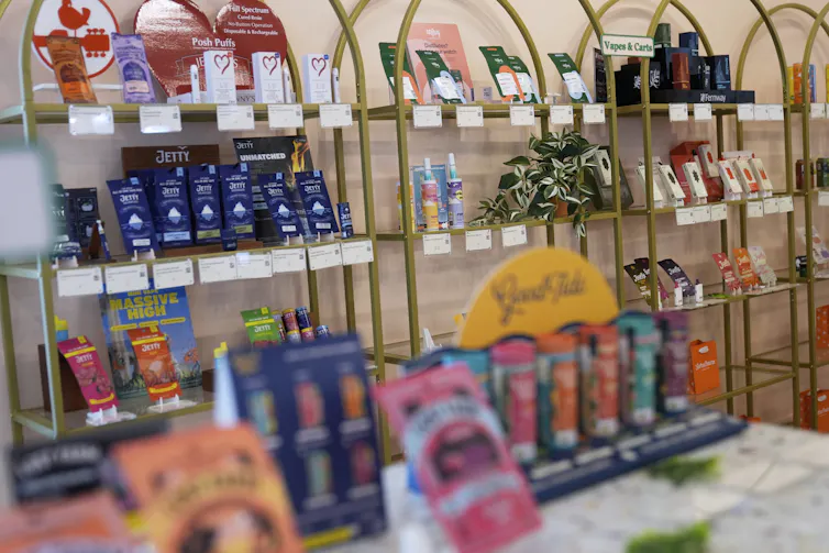Shelves of cannabis products on display in a store
